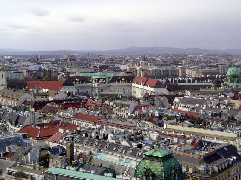 Seen from the top of St. Stephens, the city spreads southwesterly far beyond the line of the old wall. The Michaelerkuppel or dome of the Ho