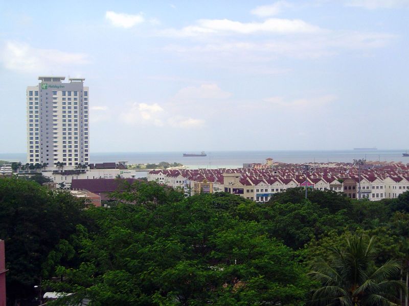 And grows; the view here is west, across the busy strait separating Melaka from Sumatra.