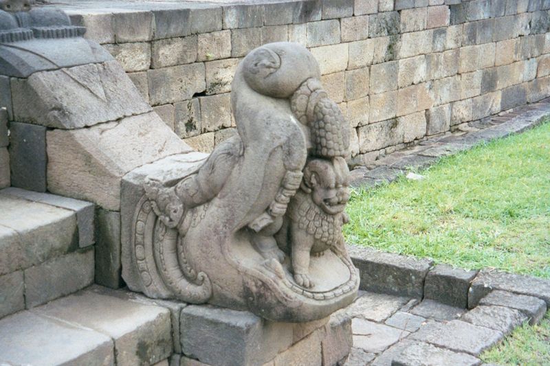 The stairs are decorated with makaras, mythical sea-monsters that disgorge other animals—in this case a lion.