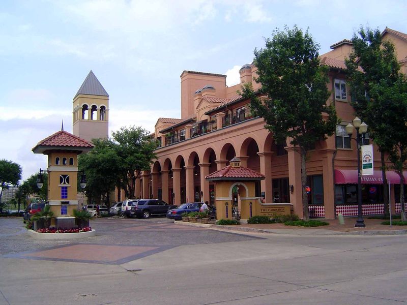 Closer to the road that parallels the canal, this mixed-use development—shops down, apartments up—is more successful.