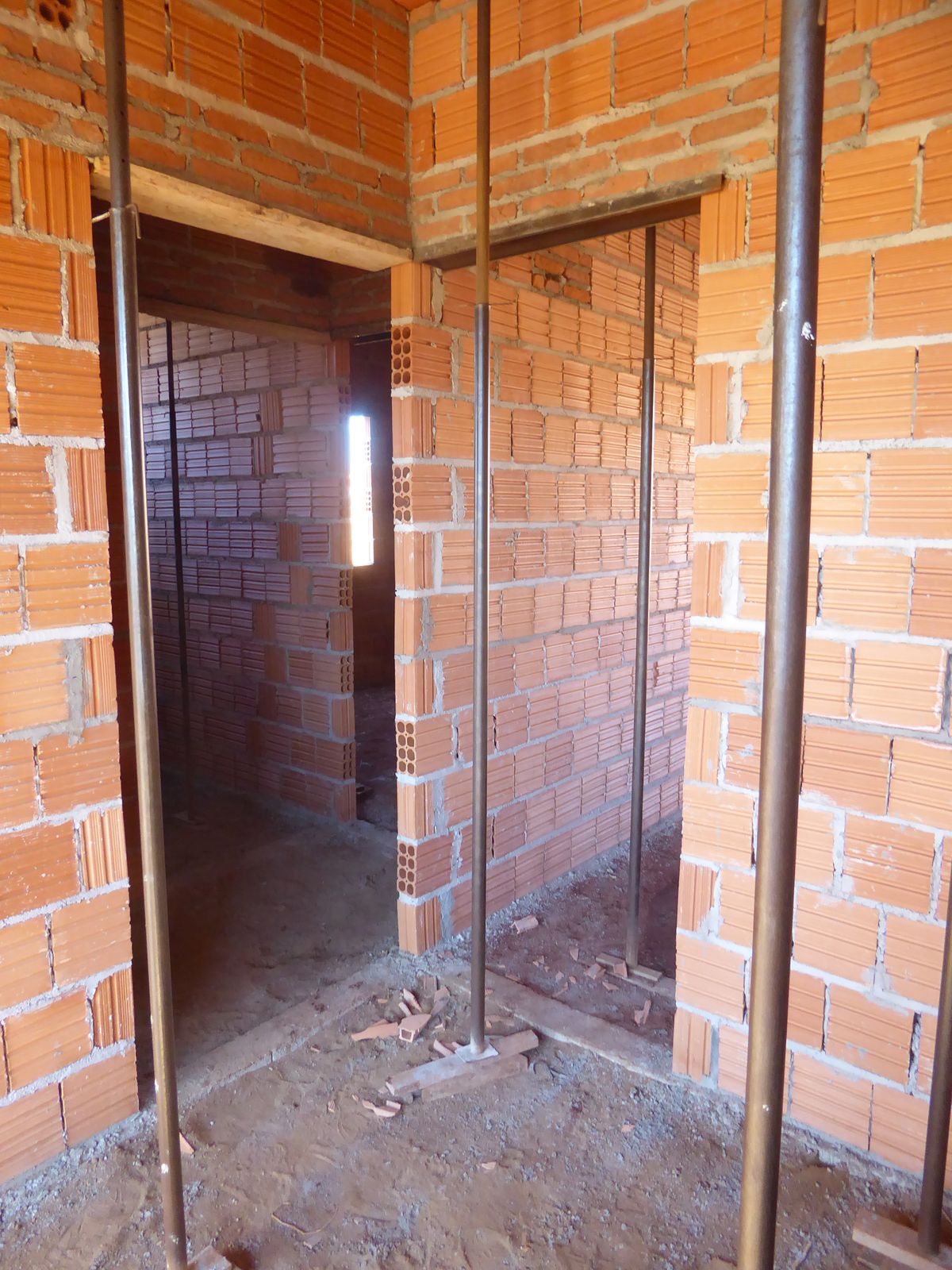 We're in the front or living room; the kitchen is to the right through the door; there are two bedrooms on the left, with a bathroom in betw