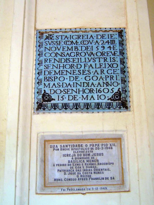 The upper tablet reads: "This Church of Jesus was begun to be built on the 24th November 1594, and the most Reverend and Illustrious Lord Do