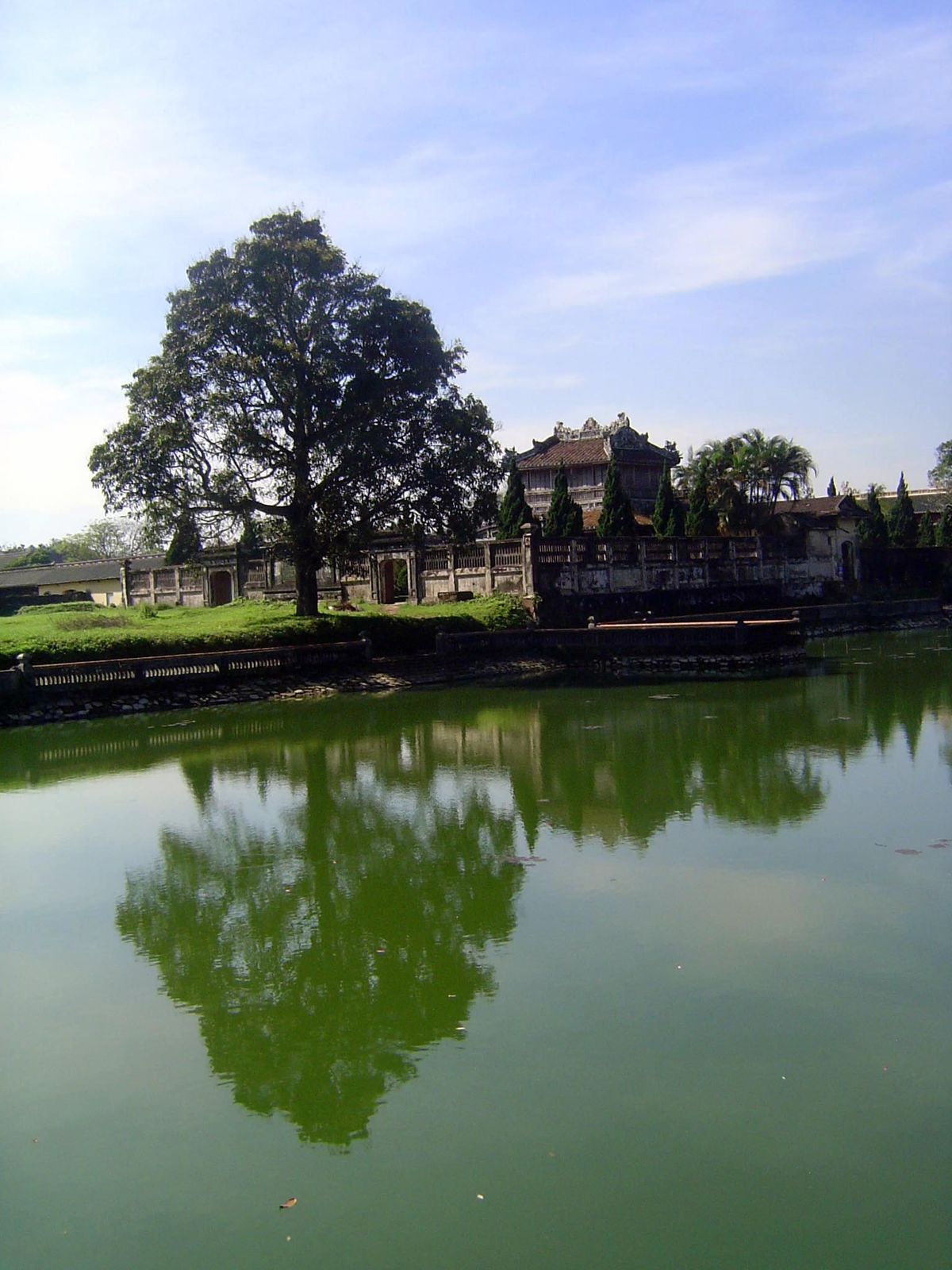 Looking southwest across a pond toward the reading room.