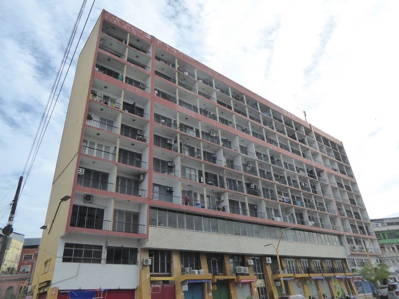 There are highrises, too, some rundown. Does this look like an apartment building? No? There's a good reason.