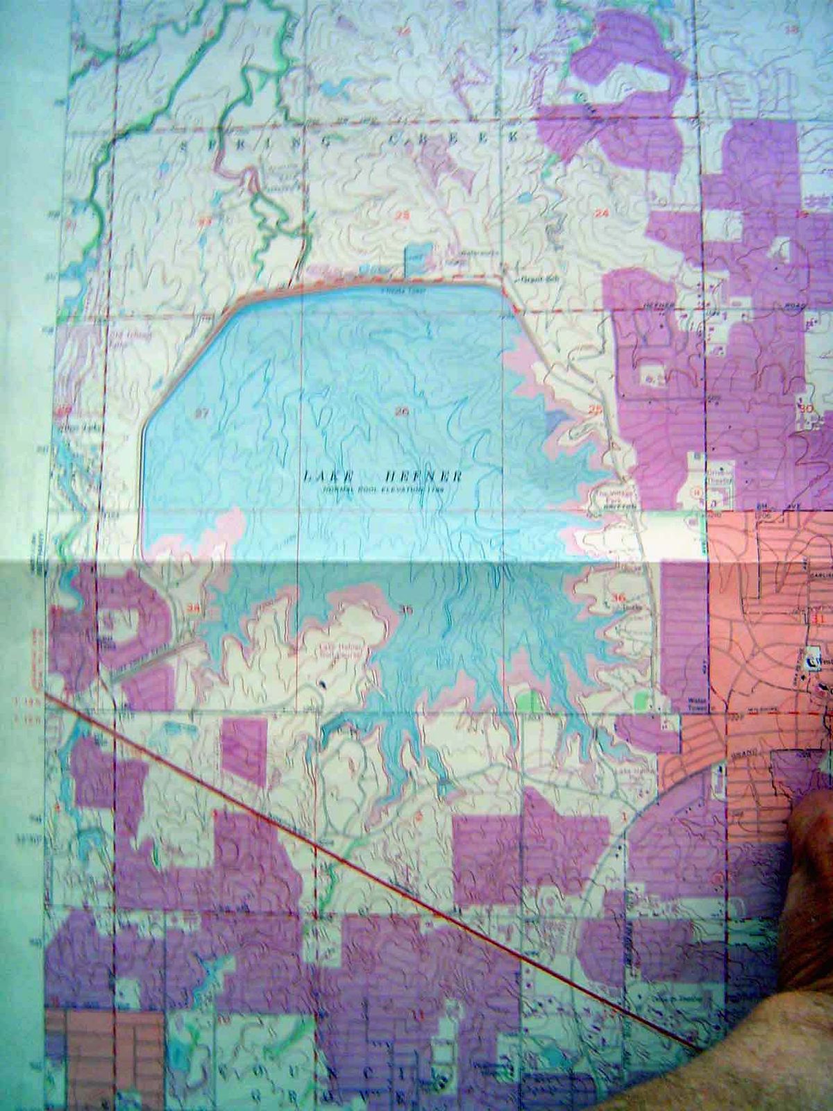 Here's the reservoir as shown on a USGS topo sheet which shows in dramatic purple the city's rapid growth. Lake Overholser is off to the low
