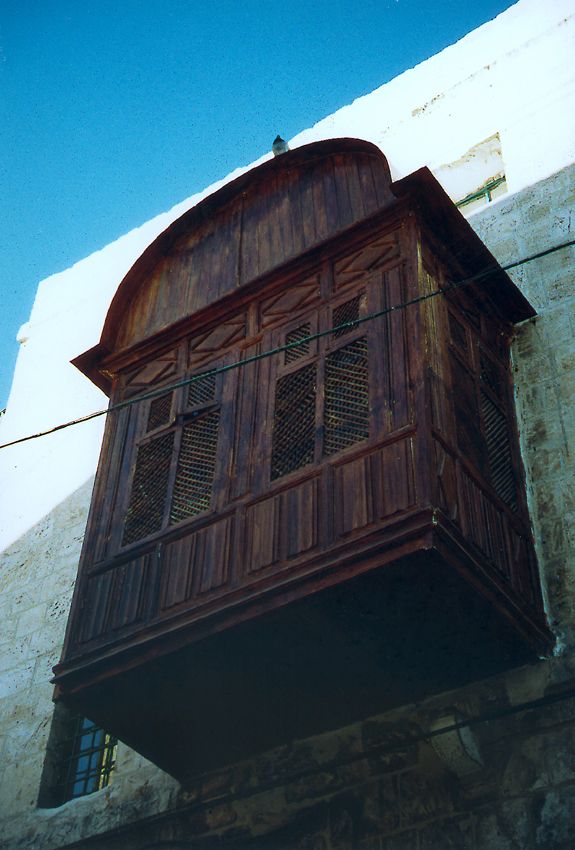 This is one of the city's rare bits of meshrabiyya, the projecting and screened wooden windows that once were characteristic of cities from 