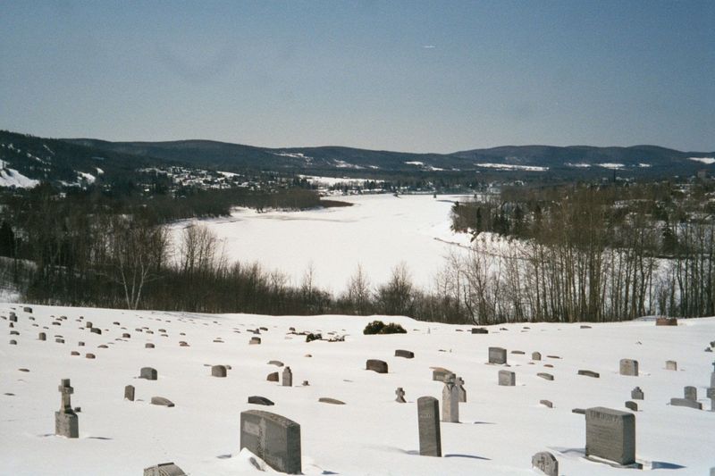 Rivers, roads, houses, barns.... Time for a cemetery in the snow. People who die in the winter are buried in the spring, after the ground th