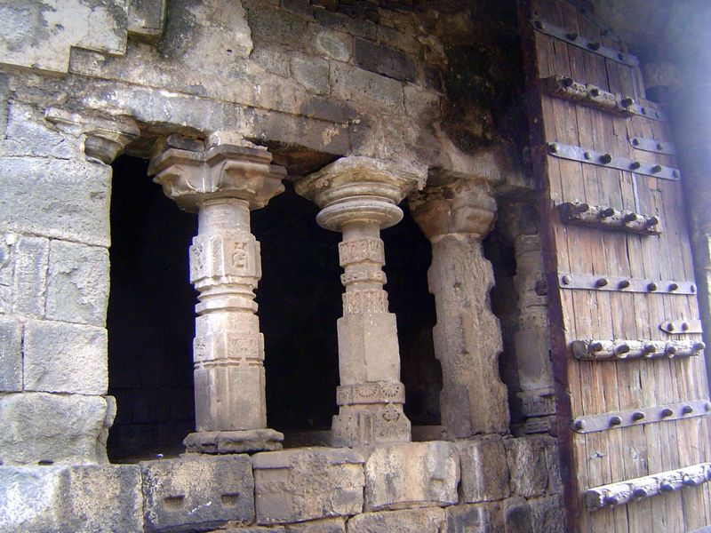 A porch from which to watch passersby. The builders presumably cannibalized older Hindu structures for these fine but mismatched columns.