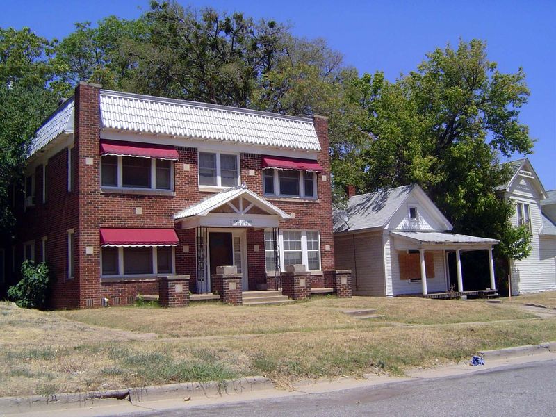 Just north of the school's front door, these are the Memory Lane Apartments, at 509 NW 7th. They were built in 1900 and have been in the sam
