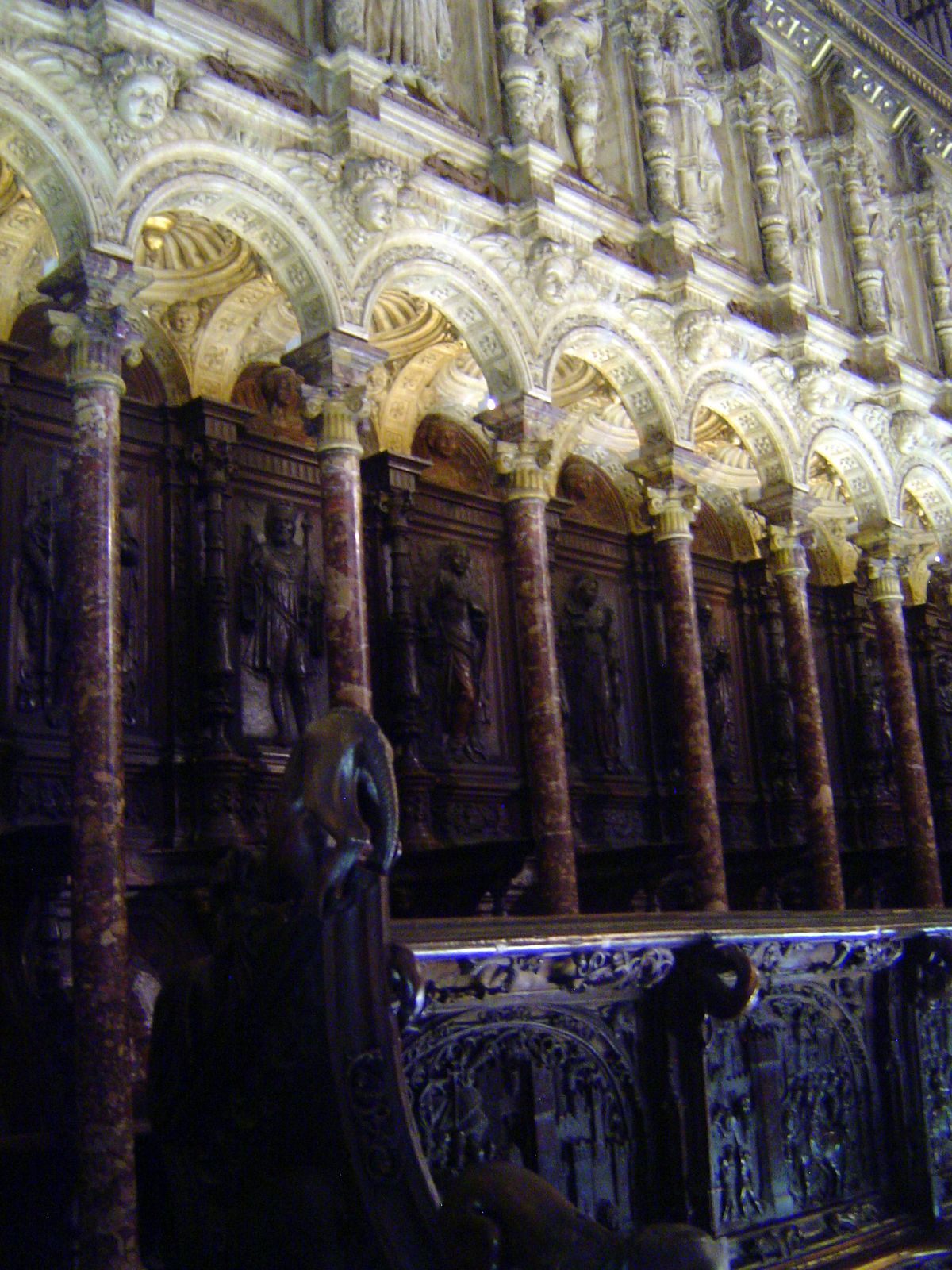 The carved stalls in the choir, from about 1540, recount the conquest of Granada, which at the time would still have been remembered by the 
