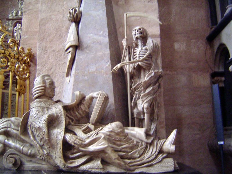Momento mori: a skeleton in the cathedral mocks the living.