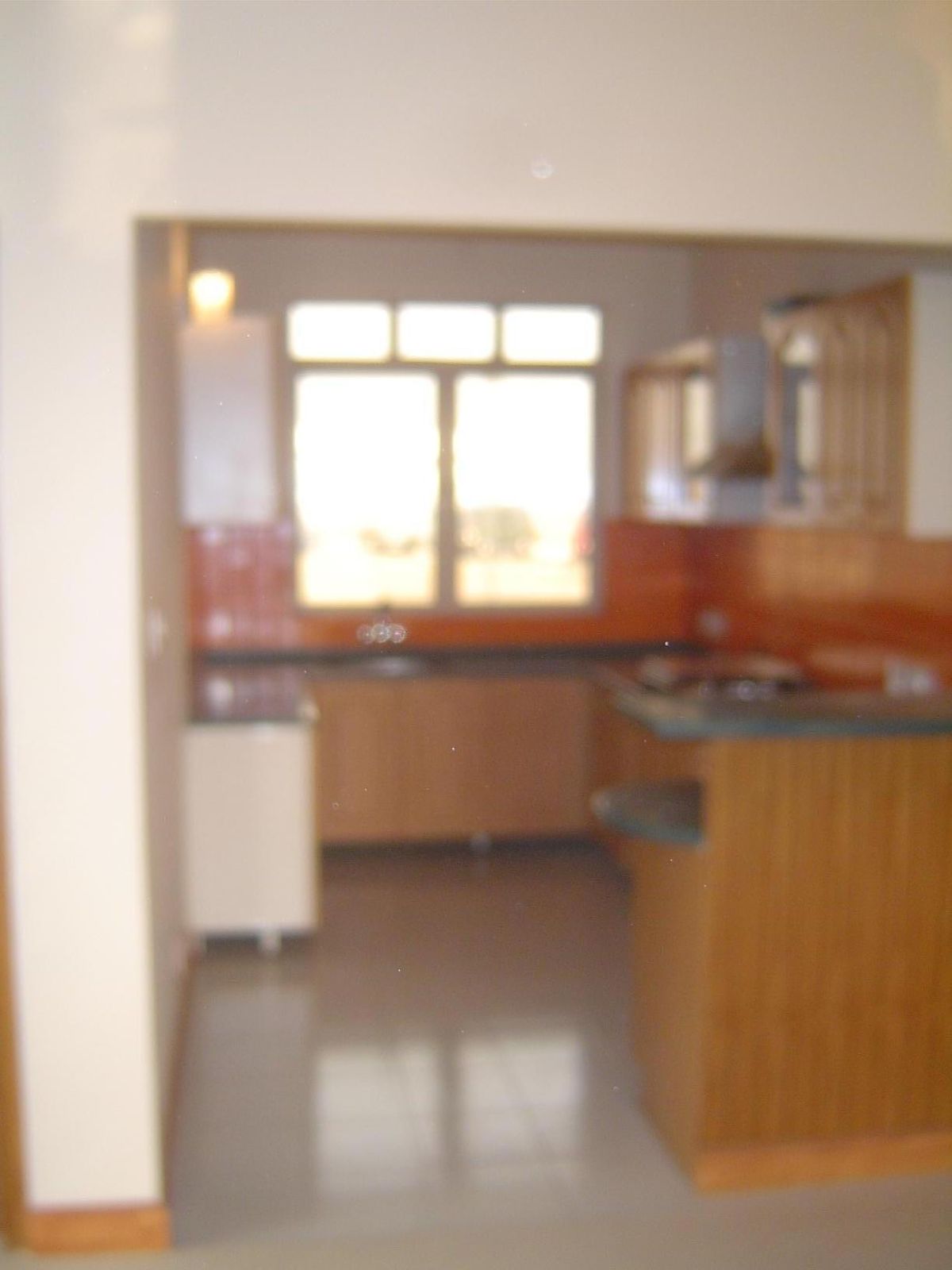 There's nothing on the site yet except a sales office and a model home. Here's the kitchen, with drawers that glide, to the delight of the h
