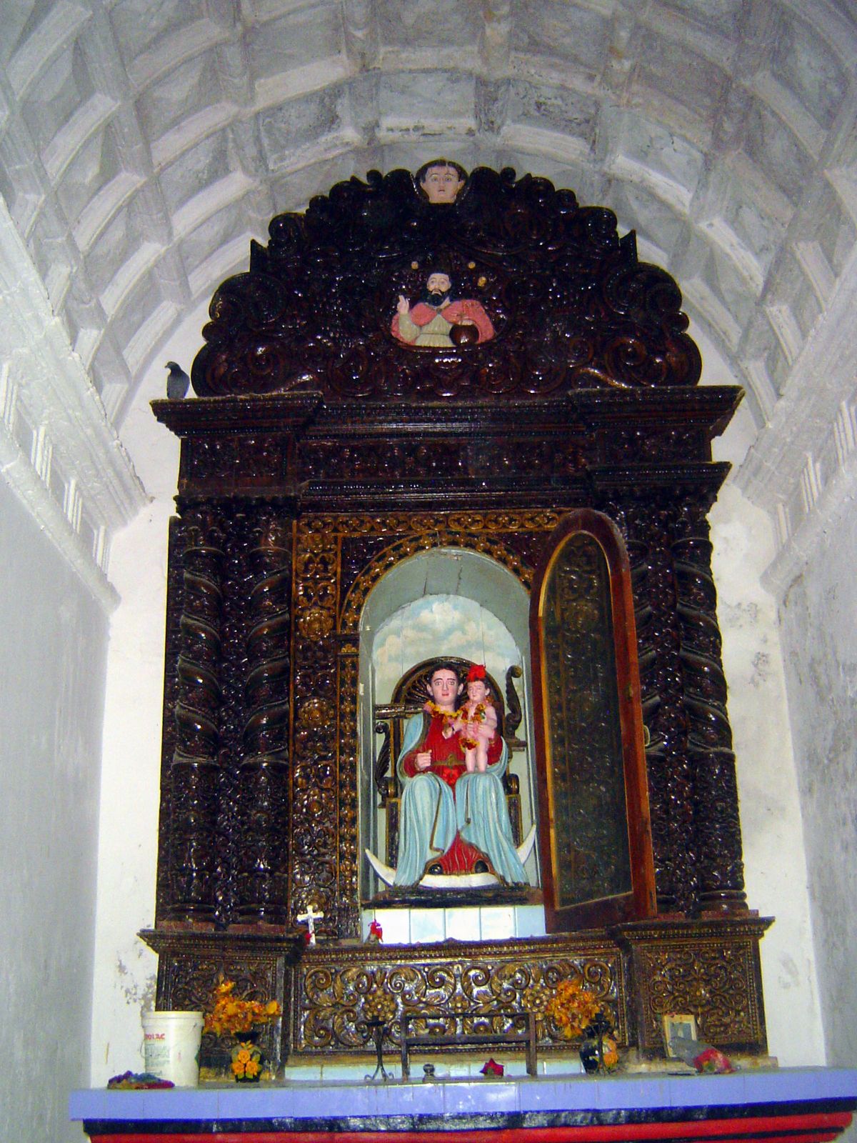 Once again, the nave has a masonry vault but the elaborate altarpiece is wood from somewhere.
