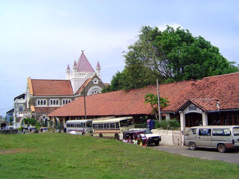 The same office building, looking in the opposite direction, past All Saints, the Anglican church. The streets form a small grid.