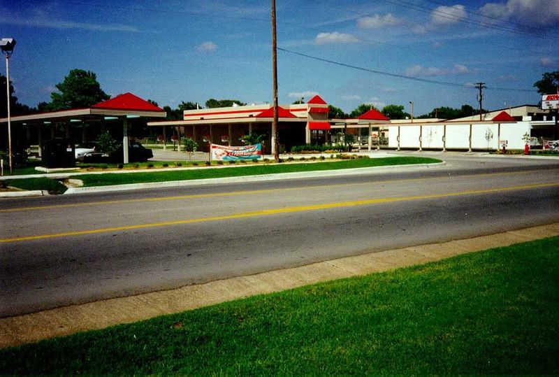Lindsey Street for a mile east of the freeway is a carnival of fast food and gas stations, with a leavening of churches and adult entertainm