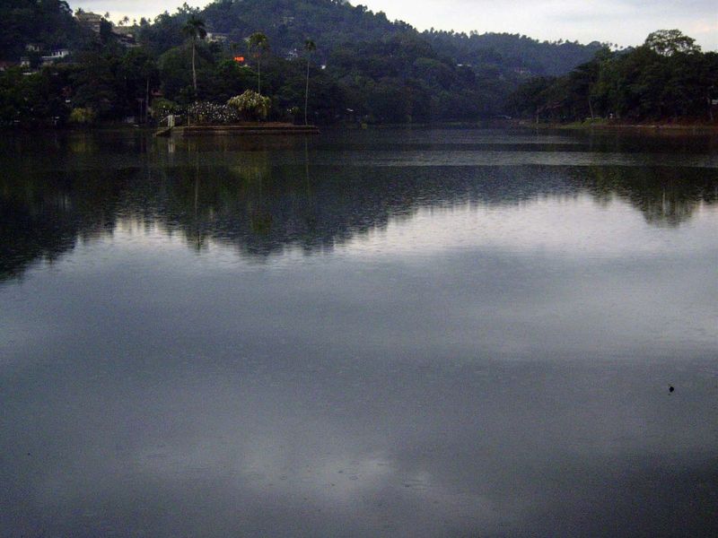 Kandy Lake—shown here during a shower—was built late in the city's history: until 1810, its 46 flooded acres were paddy fields. The lake was