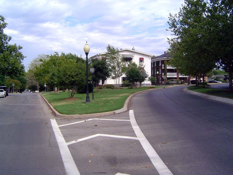 Same place, here looking east on 18th Street, where the track curved south to Shartel. This is an area generally of big single-family homes,