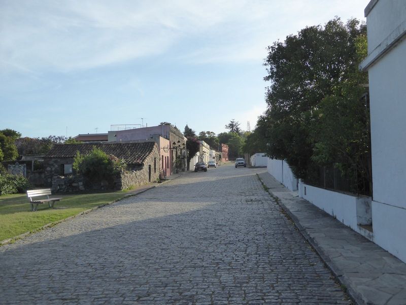 A Portuguese street, probably repaved at some point but still ignoring the cardinal rectitude of Spanish towns. The Portuguese part of Colon