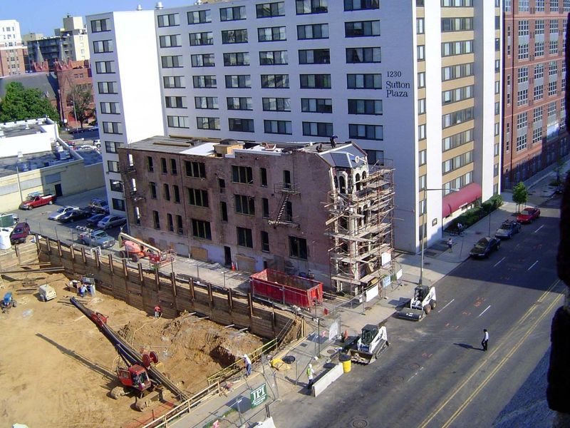 Here, at 13th and M, a new building is about to rise next to a determined and freshly restored survivor.