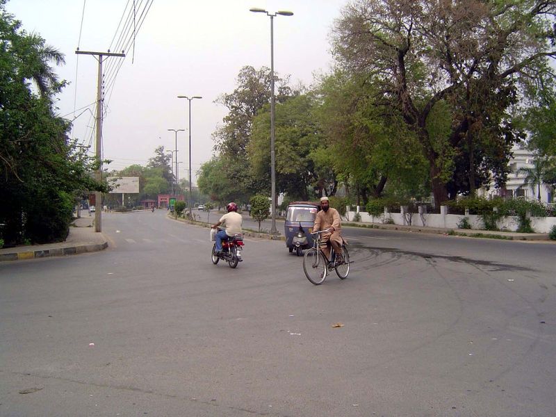 Model Town is designed in eight superblocks surrounding a ring road, which is two miles in circumference around a central park with a lake t