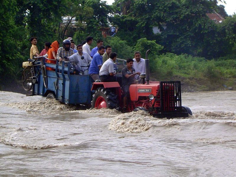 Finally, a tractor ventures across.