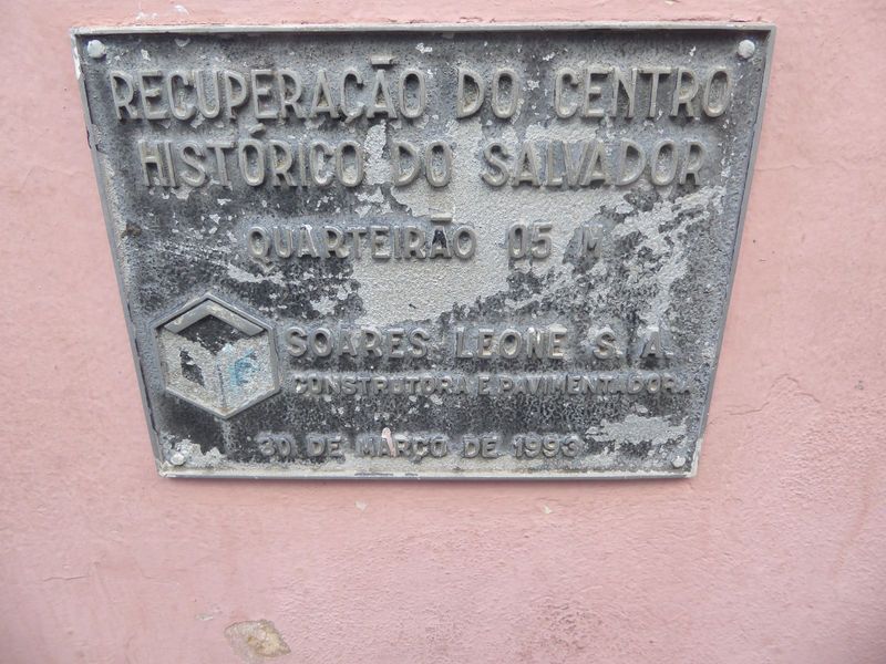 A wall-mounted plaque recalls the restoration effort.