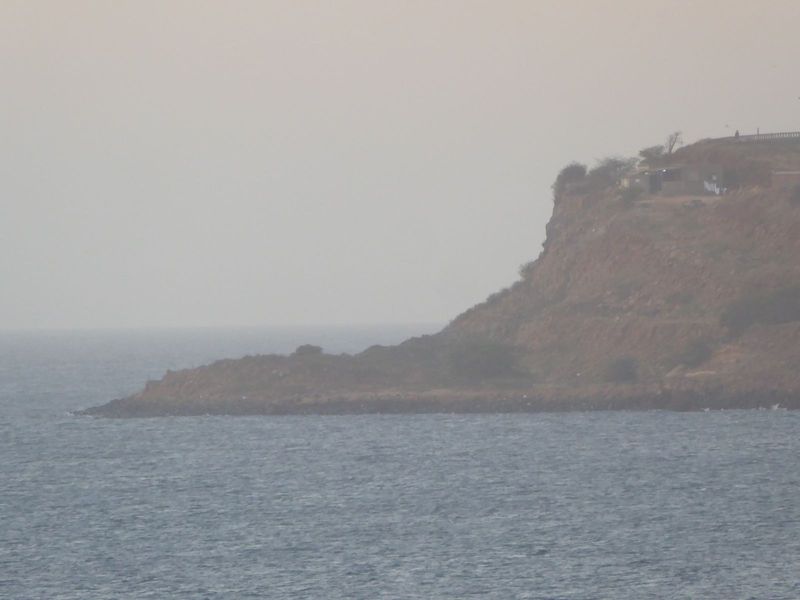 Here's a hazy Cap Manuel, the tip of the hook of the Cape Verde Peninsula. You might like to sit at the point it's one of those geographical