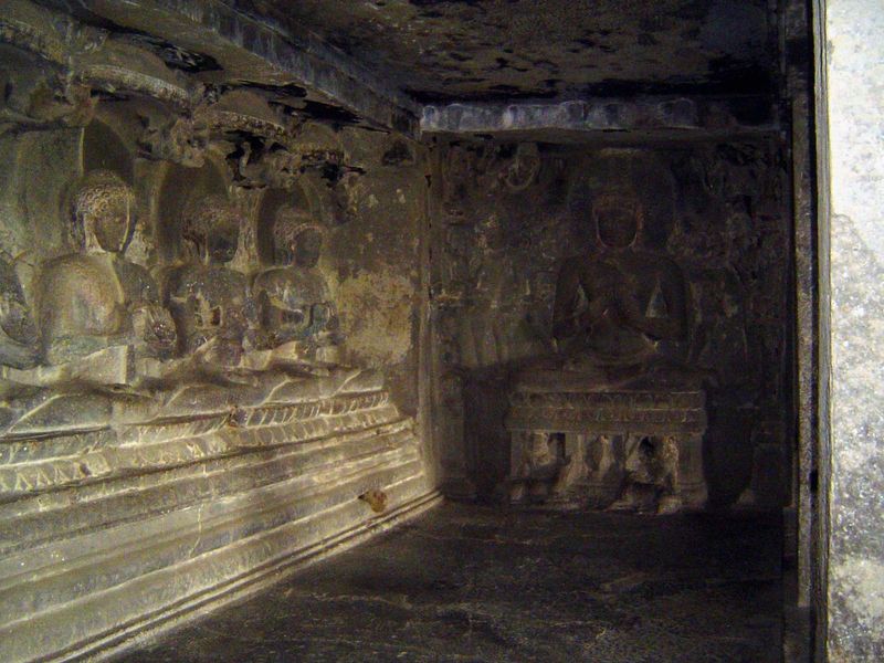 A circle of Manushi Buddhas rim the room. Maitreya, the future buddha, will descend to earth in this form.
