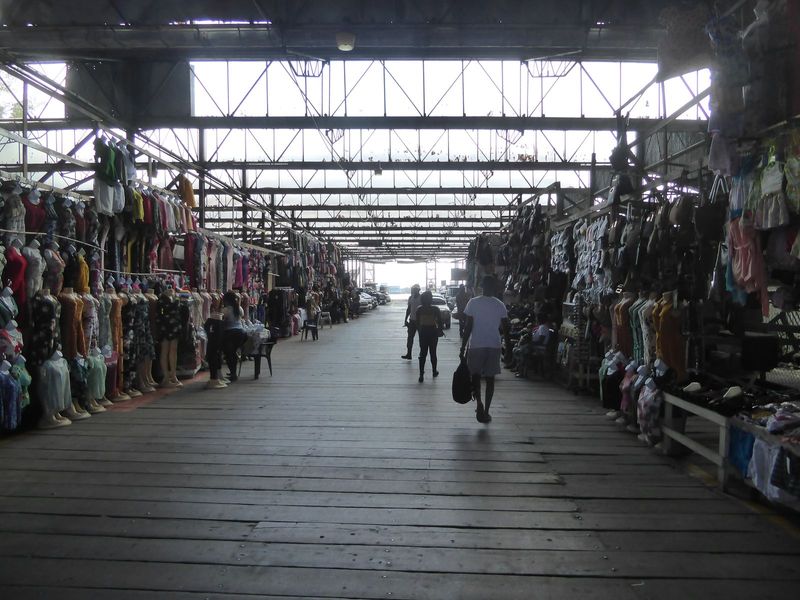 The dock is now a parking lot with a lineup of boutiques.