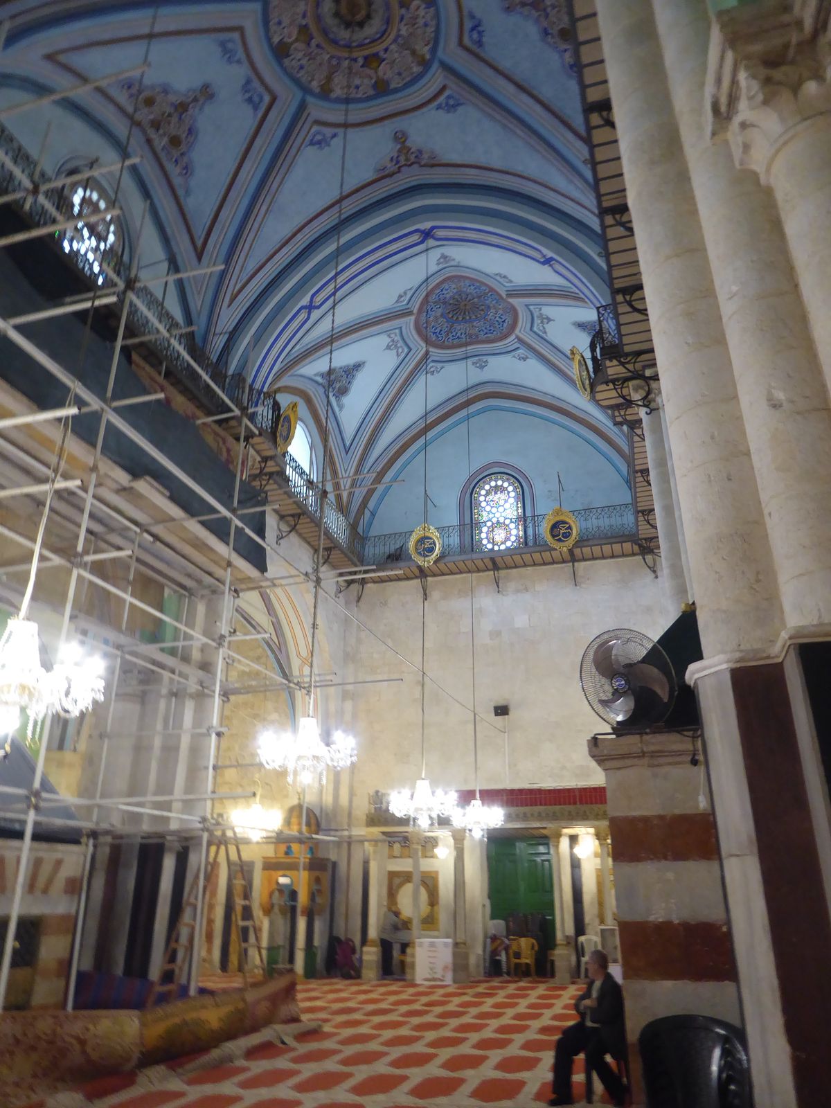 We're spun around 180 degrees. Abraham's cenotaph is on the other side of the wall. See that man scrutinizing it?