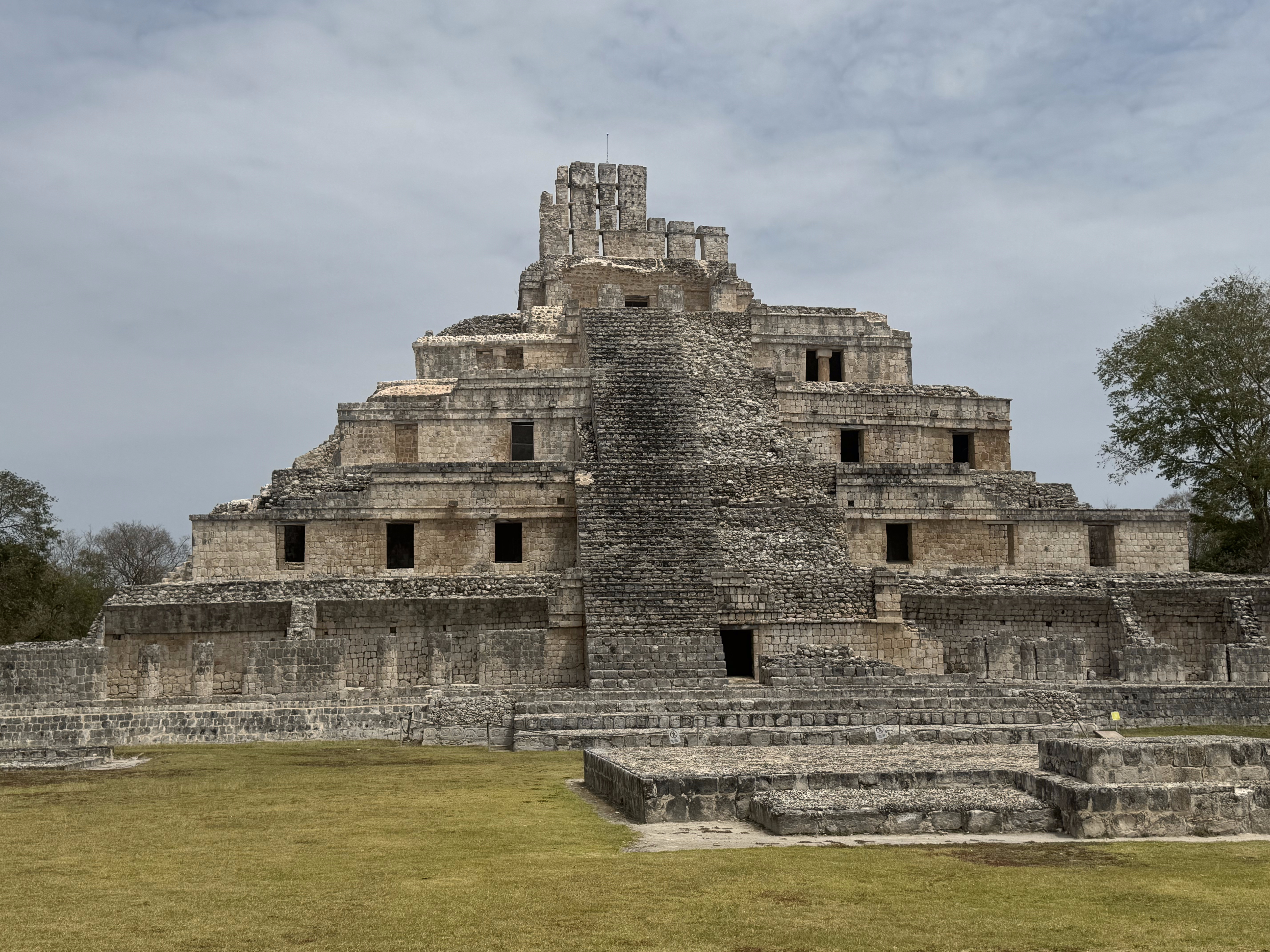 It's the palace or temple of five stories. Call me a barbarian, but I see kids playing peekaboo or hide-and-seek.