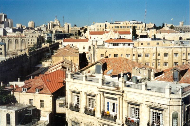 Further into the Christian Quarter, with an old but still operating hotel in the foreground. The neighborhood is dominated by properties bel
