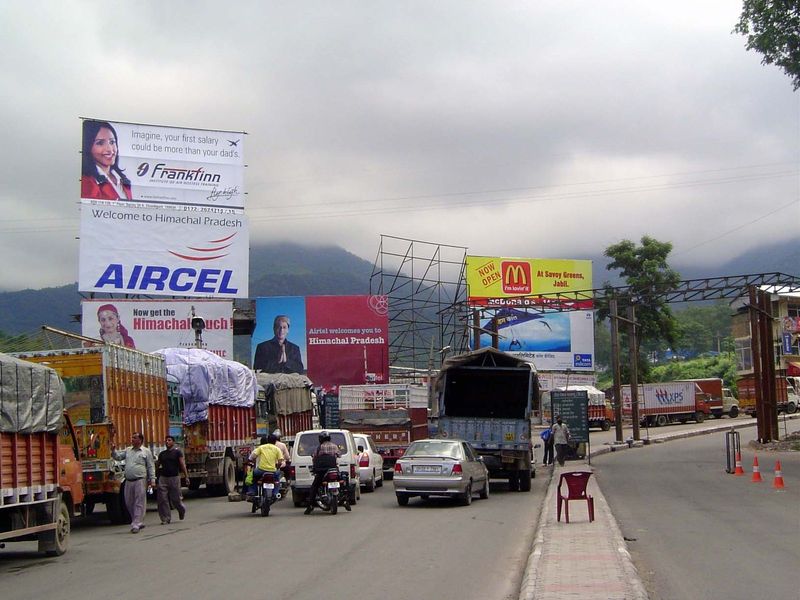 Commercial vehicles and that includes rental cars must pay a stiff daily toll when entering Himachal Pradesh, here near Parwanoo. Comparable