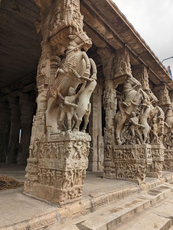 The other side of the same courtyard has the smaller Seshagiri-Rao pillared hall.  The monolithic pillars are typical of the Vijayanagara Em