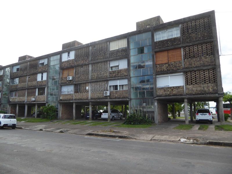 The meat-packing factory stayed in business long enough to justify this modernist block facing the soccer field.