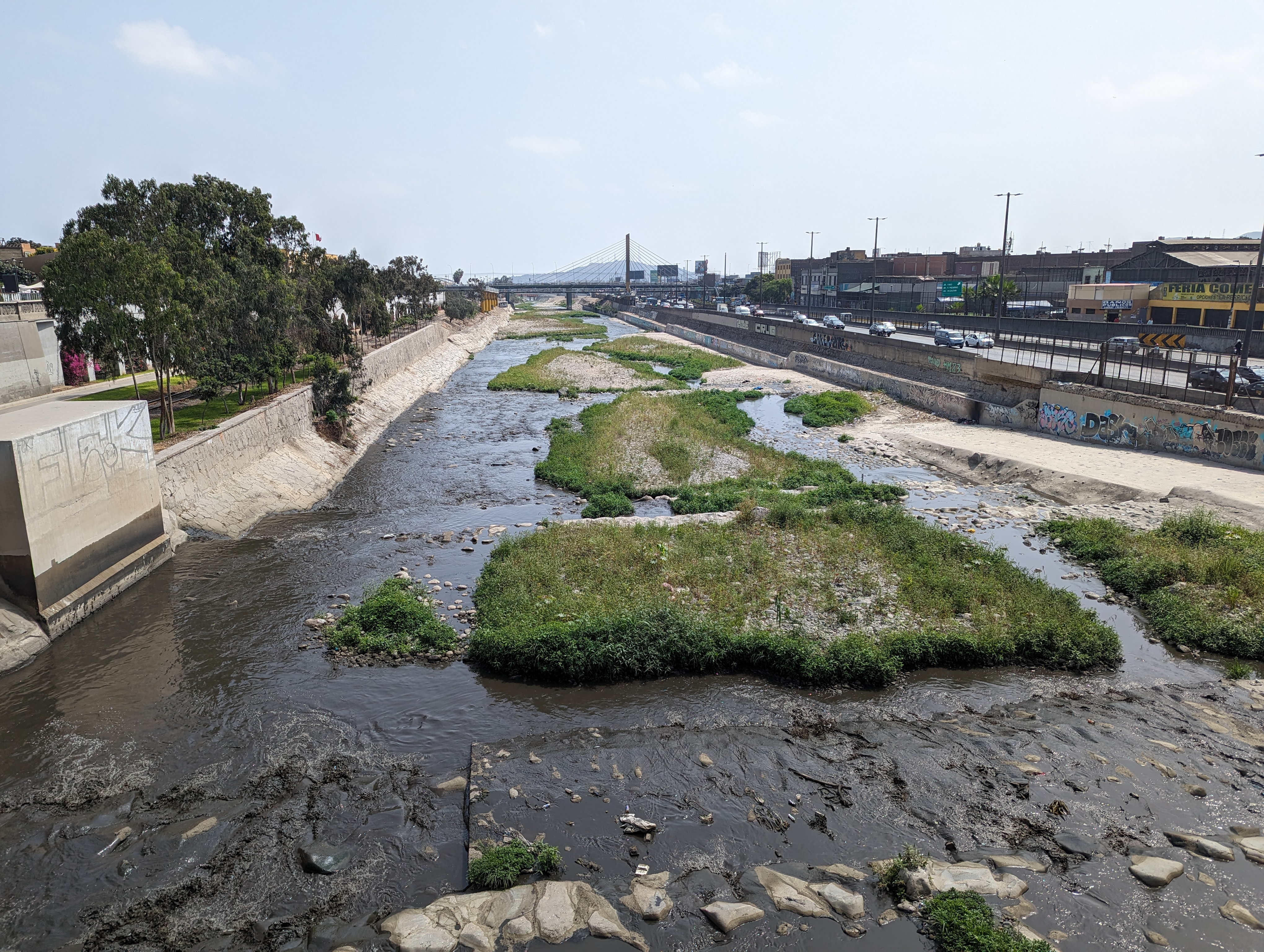 Back to the river, seen again from the Puente de Piedra but looking downstream.  Fishing?  Wading?  How about just sitting on the banks to a