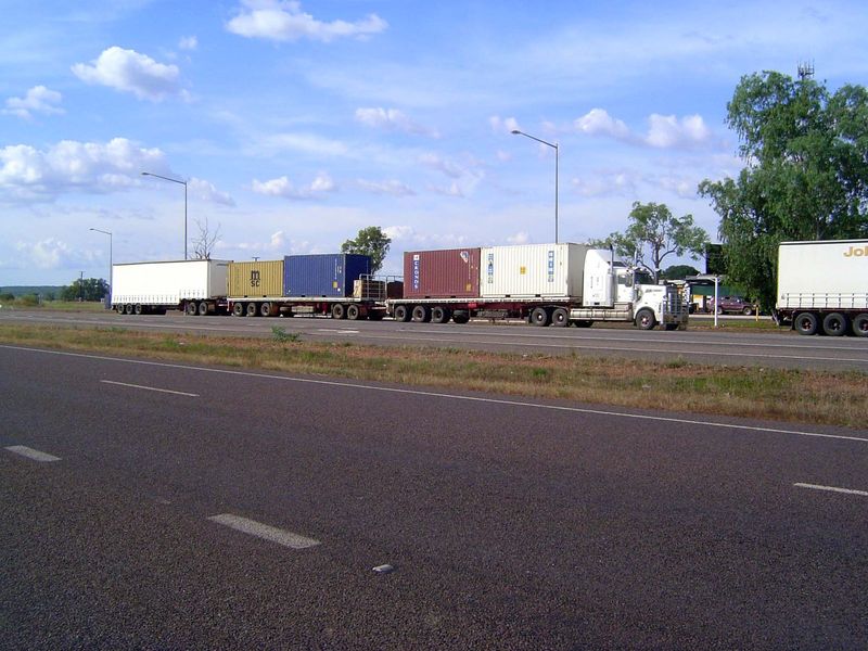 A mixed-cargo road train.