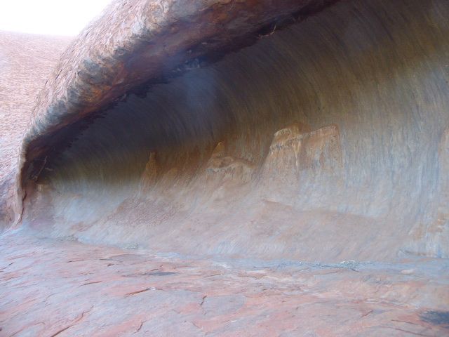 Here's one of these channels. It's at the base of the rock and has a diameter of about four feet.