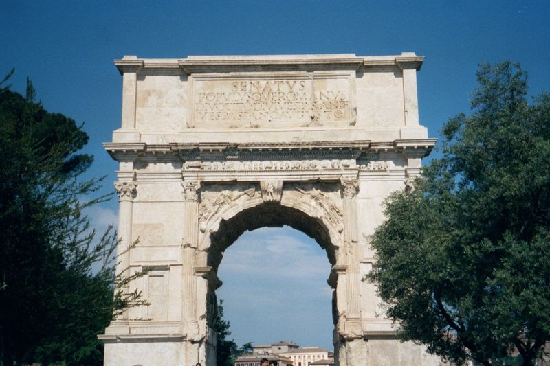 Two minutes walk west along the Via Sacra we come to the Arch of Titus, dedicated in 81 to mark the defeat of the Jews in 70. The arch carri