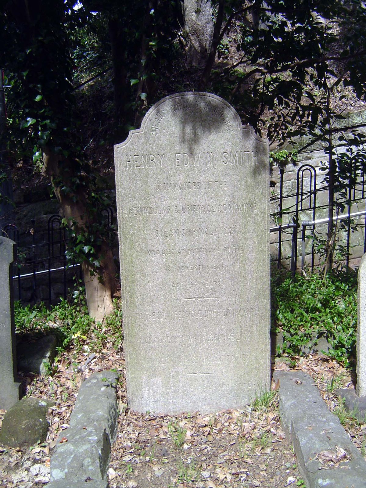 Here Lies Henry Edwin Smith, Commander of the Peninsular and Oriental Company's Steamship Malacca, who died at Yokohoma at the 18th of Decem