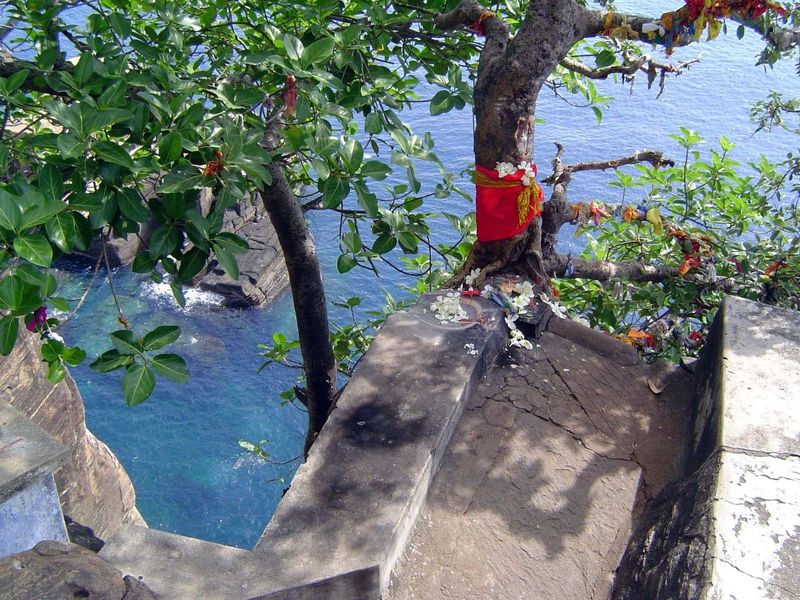 This is Tamil country. Hence the Hindu shrine atop the cliff.