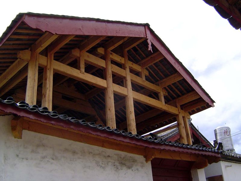 It takes a lot of wood to make this kind of building, with its transverse tie-beams mortised into\ pillars.\  In Chinese, this\ technique is