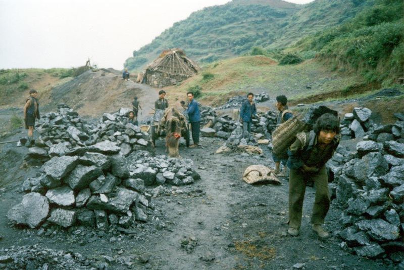 The crew is all teenagers, here at the dump where coal accumulates.