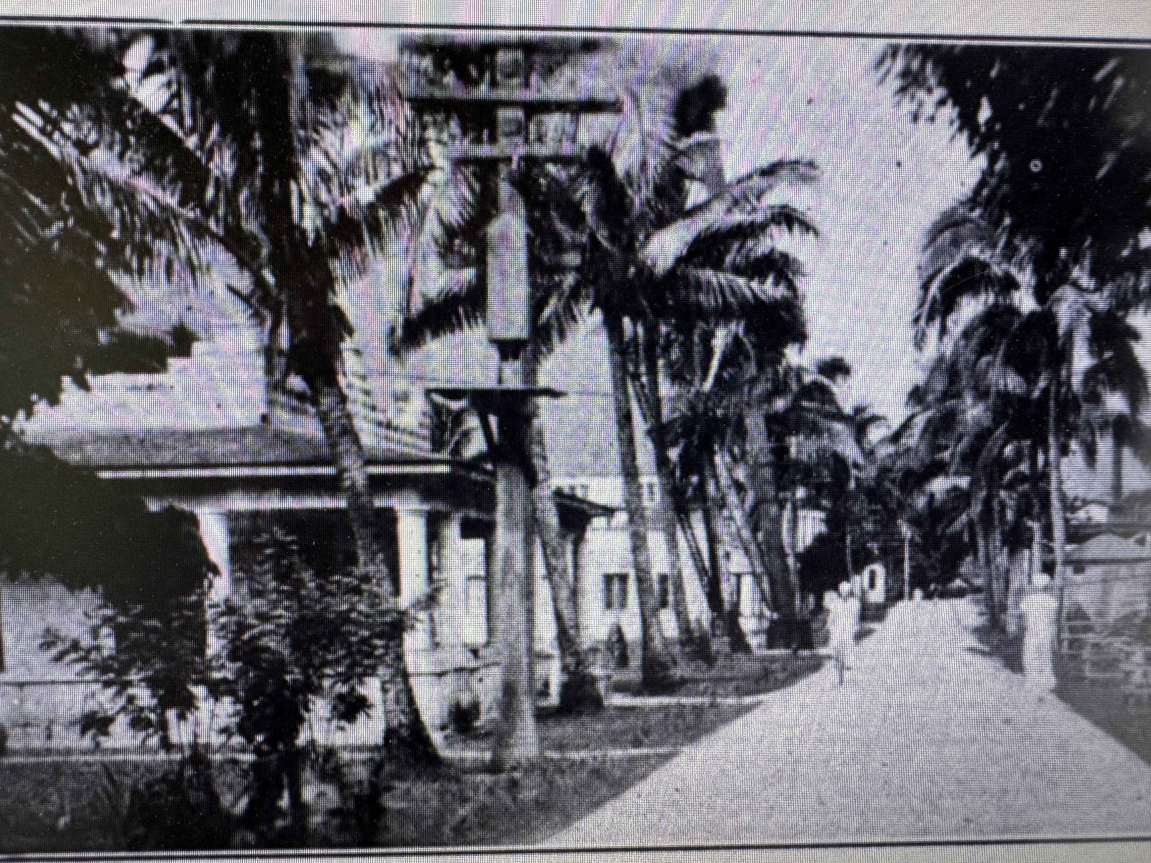 Here's the main road of the naval station. The building housed the Navy's radio station General Report by the Governor, p. 138.
