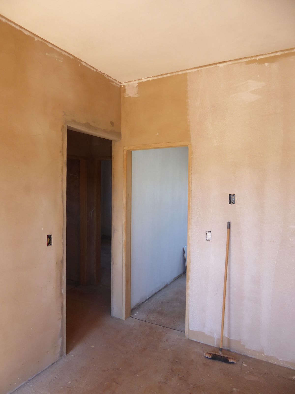 Finished walls in the house next door.