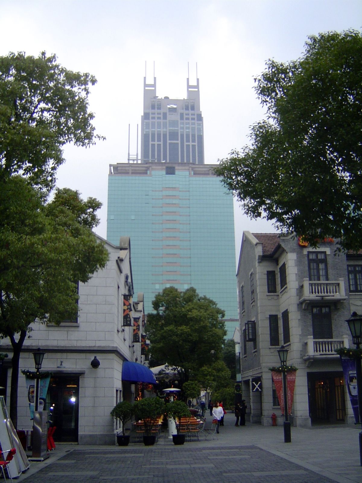 Juxtaposition: Xintiandi and the New World Tower.