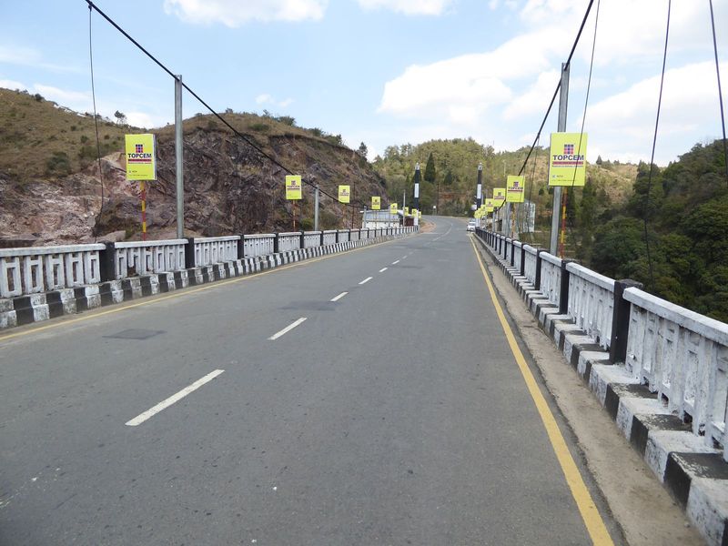 The road continues south and uphill.