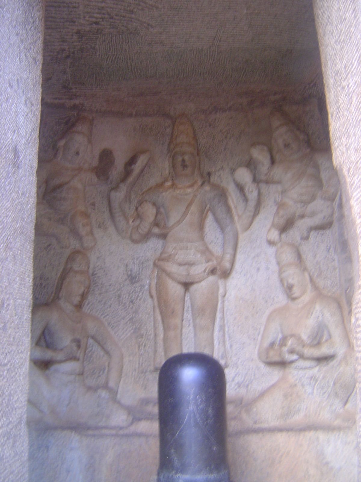 The lingam is a later addition to the central shrine, which also shows Shiva in human form.