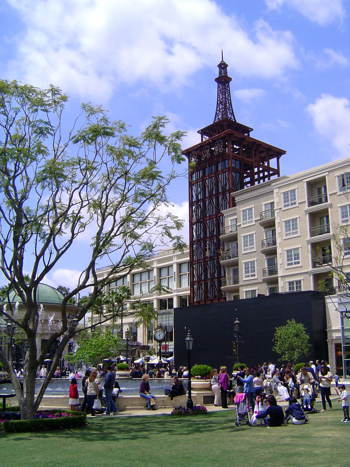 The quasi-Eiffel Tower houses three elevators serving a massive garage.