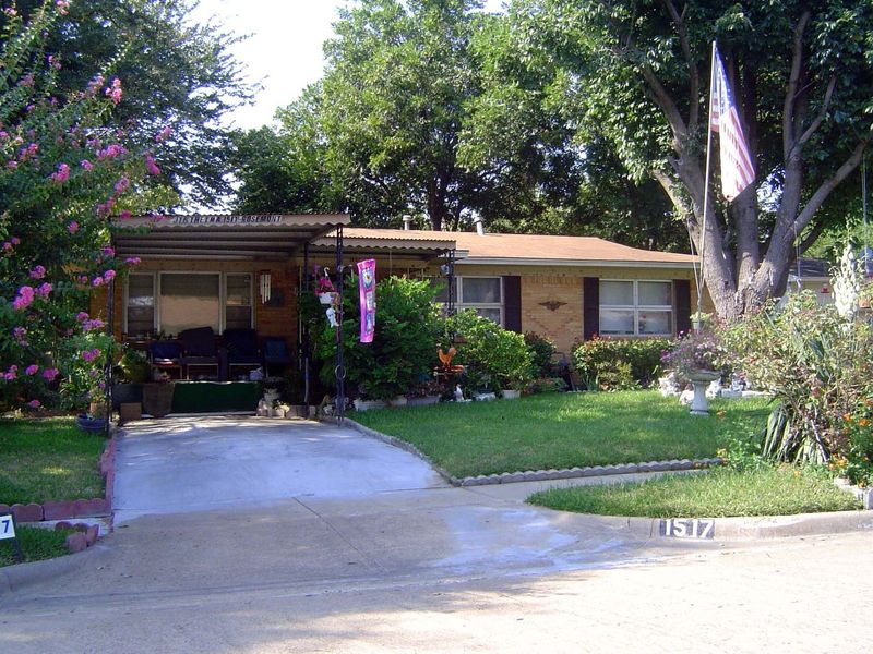 Thousands of houses were built all around the core city of Dallas during the 1950s. Here's one in Mesquite, whose population went from 1,700